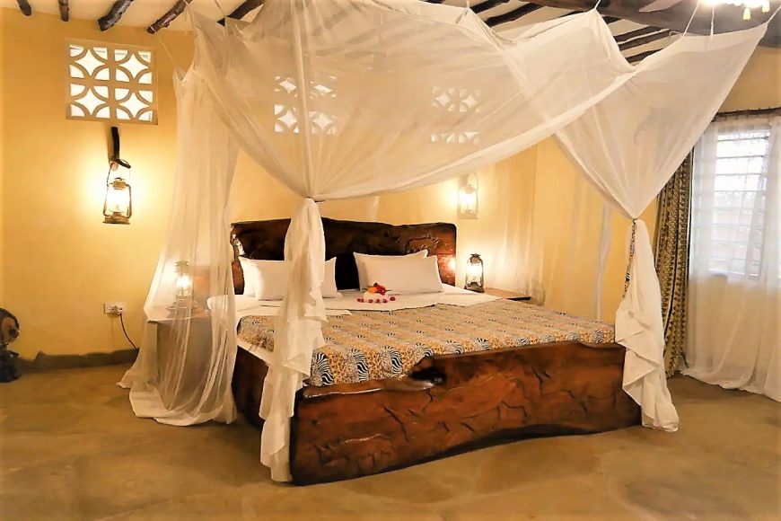 Villa N view of master bedroom with art designer bed 